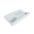 A custom contoured baby changing pad cover, personalized with the name 'COLTON joseph' in brown and blue script, decorated with a watercolor illustration of a blue and brown airplane, on a clean white background.