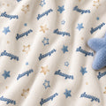 Personalized Blue Star Baby Boy Blanket. Soft watercolor blue stars create a dreamy sky for a custom name on a white background.