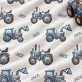 Personalized Blue Tractor Baby Boy Blanket. Blue tractors bring a playful countryside touch to a custom name on a white background.
