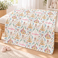 Personalized Boho Floral Baby Girl Blanket. Rose-colored flowers, leafy sprigs, feathers, and illustrated teepees surround a custom name in a whimsical boho design.