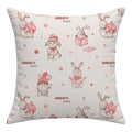 A square throw pillow featuring a repeating watercolor pattern of rabbits in winter clothing, including Santa hats and scarves, holding pink ornaments, with the name 'CHARLOTTE' and 'ann' printed in red text. The background of the pillow is a warm cream color.