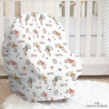 A personalized infant car seat cover featuring a dirty bike pattern with the name Carter on it