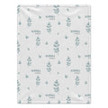 A square baby blanket with a repeating pattern of muted blue-green leafy sprigs and the text 'SOPHIA Maria' on a warm off-white background.