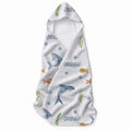 White hooded towel featuring blue sharks, yellow and orange fish, green seaweed, blue bubbles, and the name Josiah.