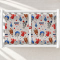Personalized changing pad cover featuring smiling footballs, blue helmets, red megaphones, and playful sideline characters