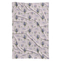 Pale blush swaddle blanket with blue and lavender larkspur bouquets, green leaves, and the name Sophia Kate in blue and green.