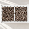 Brown Leopard Print Changing Pad Cover, featuring warm, earthy leopard spots for a stylish finishing touch to a modern or boho nursery.