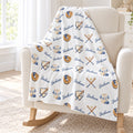 Personalized Baseball Baby Boy Blanket. Baseballs, bats, gloves, and other baseball details surround a custom name in a playful sports design.