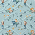 Light blue fabric with a repeating mermaid and sea life print, including mermaids with turtles, dolphins, fish, starfish, and sea plants.