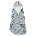 Light blue hooded towel with whales, dolphins, narwhals, turtles, jellyfish, shells, starfish, and the name Sailor in script.