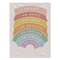 A personalizedwith a pastel rainbow design featuring positive self-affirmations like 'I AM KIND', 'I AM BRAVE', and 'I AM LOVED' in white text.