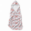 White hooded towel featuring peach and coral butterflies in different sizes and the name Emery in coordinating script.