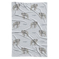 Full view of Little Elephant personalized swaddle blanket with repeating gray watercolor elephants and the name Cooper on pale blue.