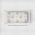 Little Giraffe crib sheet personalized with Emerson, shown with a horizontal pattern; vertical orientation available by request.