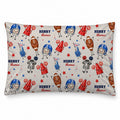 A personalized pillowcase featuring a personalized sports-themed print on a light beige background. The pattern includes cartoon football helmets, footballs, cheerleaders, stars, stripes, and the text 'HENRY Thomas' repeated throughout.
