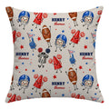 A square throw pillow with a personalized football-themed print on a light beige background. The pattern features cartoon characters including football helmets, footballs, cheerleaders, a referee, and stars, with the text 'HENRY thomas' repeated.