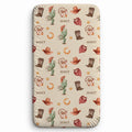 Wild West twin fitted sheet personalized with Scout, shown on a mattress with watercolor cowboy boots, hats, cacti and bandanas.