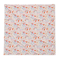 A personalized baby swaddle blanket featuring a repeating pattern of pastel-colored unicorns, rainbows, and the text 'ELIZA Grace' on a light cream background.