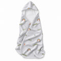White hooded towel with muted blue, peach, and gold rainbows, small butterflies, green leafy sprigs, and the name Elianne.