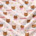 A close-up of a soft fleece blanket with a repeating pattern of cartoon owl wearing blue hats and pink dresses, scattered yellow and blue stars, small red hearts, and the name 'Samantha' printed in red script.