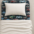 personalized vintage race cars twin sheet featuring watercolor vintage race cars in red, blue, green and silver.