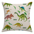 A square throw pillow featuring a colorful watercolor dinosaur pattern on a light beige background. The design includes various dinosaurs like a Brachyopterus, Triceratops, Stegosaurus, and a Spinosaurus, with the name 'CAIDEN' printed next to them.