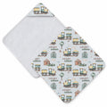 A personalized baby hooded towel with a white background and a repeating pattern of vintage train illustrations in green, yellow, and brown, with the name 'HENRY' and 'william' printed throughout. The front panel is folded over to show the soft, textured light gray fabric backing.