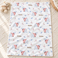 Personalized Polar Bear Baby Blanket. Gentle polar bears in pink sweaters, blue leaves, and berry sprigs surround a custom name on a white background.