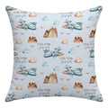 A square throw pillow with a light blue background featuring a repeating watercolor pattern of blue airplanes, brown mountains, beige clouds, and the custom text 'COLTON joseph'.