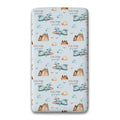 A twin fitted sheet featuring a repeating pattern of blue airplanes, brown mountains, and clouds on a light blue background. The pattern is personalized with the names 'COLTON joseph' printed repeatedly.