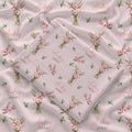 Blush pink swaddle blanket with pink gladiolus bouquets, scattered green leaves, and the name Audrey Jane repeated throughout.