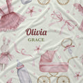 A personalized baby fabric featuring a watercolor-style print of pink bows, a bunny, a baby stroller, a pacifier, and a bottle on a cream background, with the text 'Olivia GRACE' in the center.