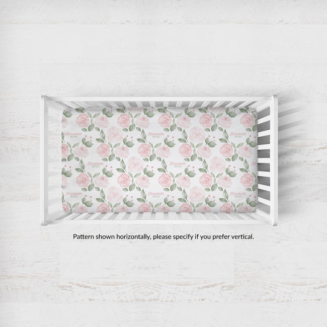 Blush Rose Garden crib sheet personalized with Elizabeth Rose; caption notes horizontal pattern placement, with vertical available by request.