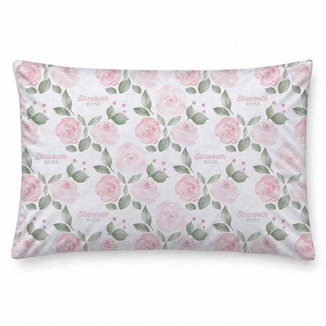 Blush Rose Garden personalized pillowcase featuring pink watercolor roses, sage green leaves, and the name Elizabeth Rose on white.
