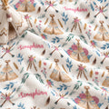 Personalized Boho Floral Baby Girl Blanket. Rose-colored flowers, leafy sprigs, feathers, and illustrated teepees surround a custom name in a whimsical boho design.
