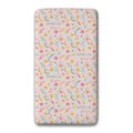 A personalized custom twin sheet with a floral pattern on a light pink background, featuring the name 'AMELIA' and the word 'Grace' printed repeatedly in blue. The sheet is shown flat against a white background with a soft drop shadow.