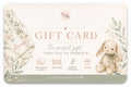 A personalized nursery gift card template featuring a cream bunny illustration, floral accents, and text that reads 'GIFT CARD' with 'The perfect gift, THEY GET TO CHOOSE' and 'CAIDENDESIGNS.COM'.