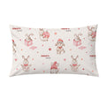 A rectangular pillowcase featuring a repeating watercolor pattern of rabbits, gnomes, books, and pink polka dots on a warm off-white background. The text 'CHARLOTTE and' is printed in a small red font.