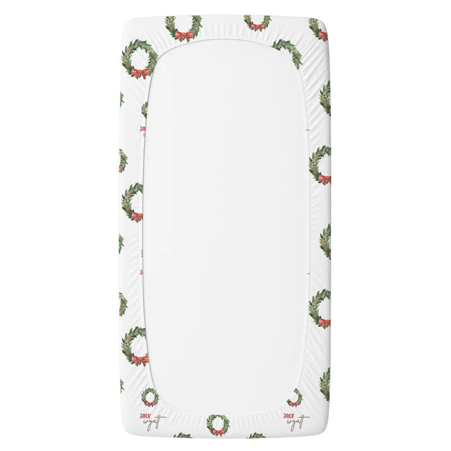 Personalized Christmas wreath twin fitted sheet with red berries and bows