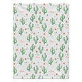 A rectangular blanket with a repeating pattern of green cacti, small orange flowers, and the name 'Mae' in peach script on a white background.