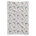 A white baby blanket featuring a repeating pattern of vintage-style BMX bicycles and the name 'CARTER' in brown text.