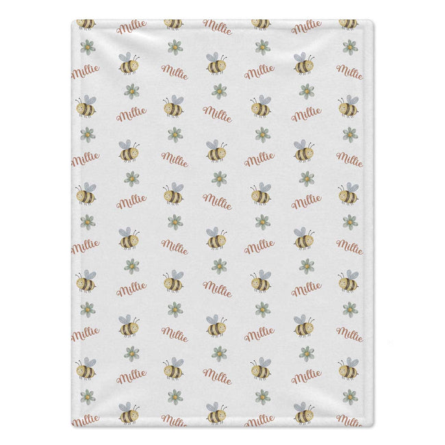 Personalized Bee Baby Girl Blanket. Sweet bees and small floral accents bring sunny garden charm to a custom name.