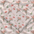 Cream swaddle blanket with peach-pink carnation bouquets, green leaves, and the name Amelia Rose in coral and green lettering.