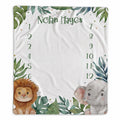Personalized jungle safari baby milestone blanket with watercolor lion, elephant, tropical leaves, custom name, and months 1–12