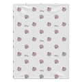A personalized baby blanket with a white background, featuring a repeating pattern of purple seashells and the name 'Riley' printed in script.