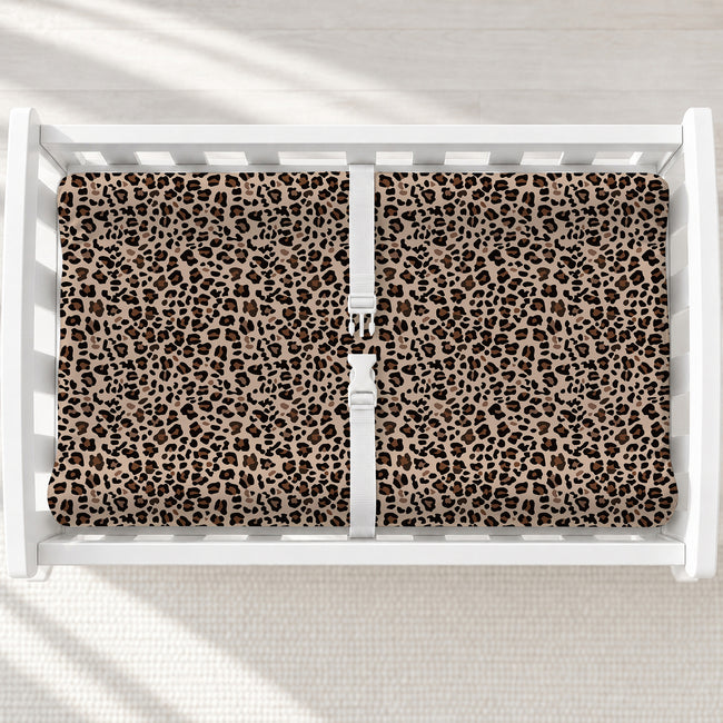 Brown Leopard Print Changing Pad Cover, featuring warm, earthy leopard spots for a stylish finishing touch to a modern or boho nursery.