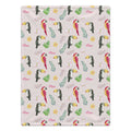 Personalized Tropical Bird Baby Girl Blanket. Colorful parrots, toucans, tropical leaves, and flowers surround a custom name on a soft pink background.