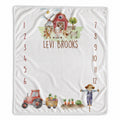 Personalized Little Red Barn baby milestone blanket with farm animals, tractor, scarecrow, custom name, and months 1–12