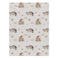 Personalized Woodland Animal Baby Blanket. Sweet hedgehogs, raccoons, snails, and meadow plants surround a custom name on a soft neutral background.
