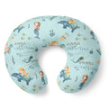 A U-shaped nursing pillow with a light blue mermaid and dolphin pattern, featuring the personalized name 'ANNA catherine' in script, shown on a white background.